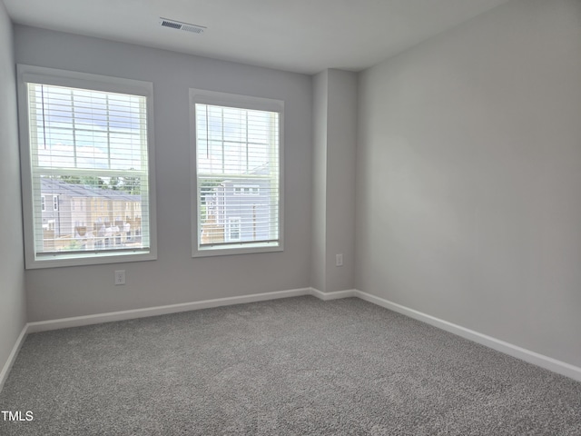 2203 Lambert Rd Unit 67, Cary, NC 27519 - carpeted spare room with baseboards