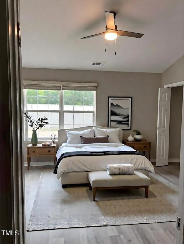 7710 River Field Dr, Raleigh, NC 27616 - bedroom with multiple windows, a ceiling fan, and baseboards