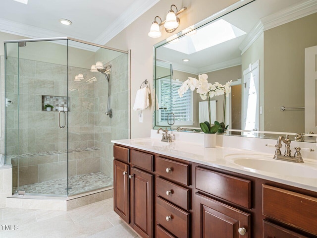 8504 Carlton Oaks Dr, Wake Forest, NC 27587 - full bathroom featuring a skylight, crown molding, double vanity, a shower stall, and tile patterned flooring