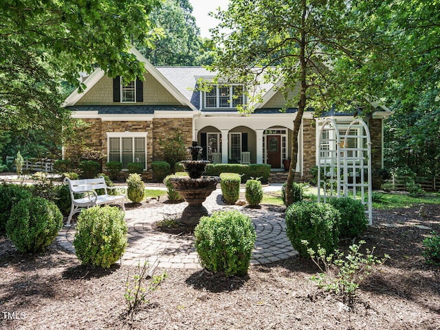 8504 Carlton Oaks Dr, Wake Forest, NC 27587 - craftsman house with stone siding and covered porch