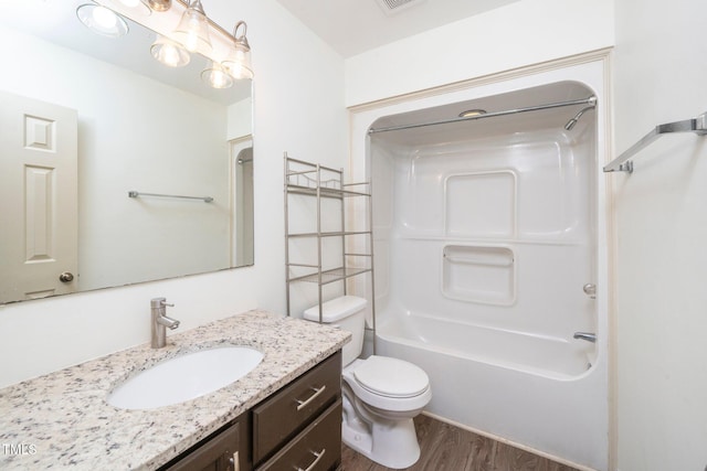 1505 Clermont Rd Unit 15, Durham, NC 27713 - bathroom with vanity, wood finished floors, toilet, and shower / bathtub combination