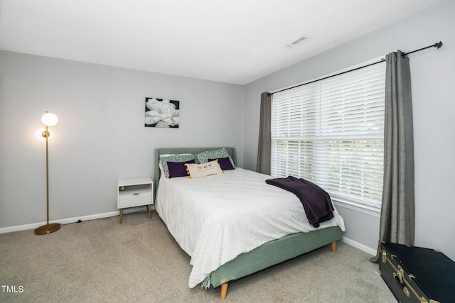 213 Bracken Ct, Raleigh, NC 27615 - bedroom with carpet flooring and baseboards