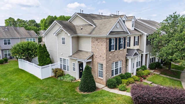 818 Bryant St, Raleigh, NC 27603 - view of front of home featuring brick siding and a shingled roof