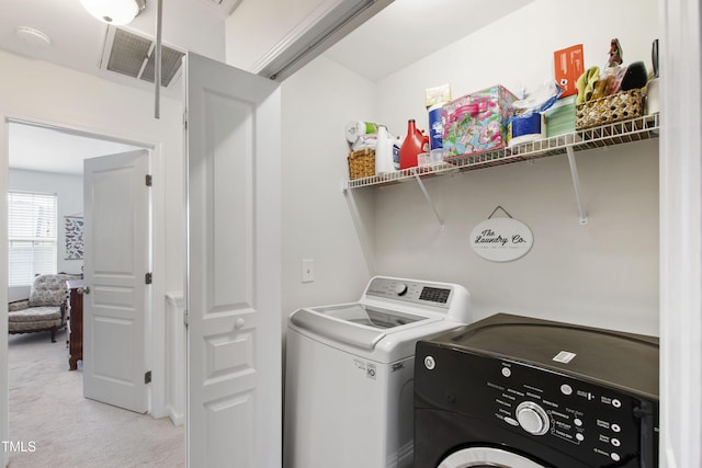 818 Bryant St, Raleigh, NC 27603 - laundry area featuring independent washer and dryer and light carpet
