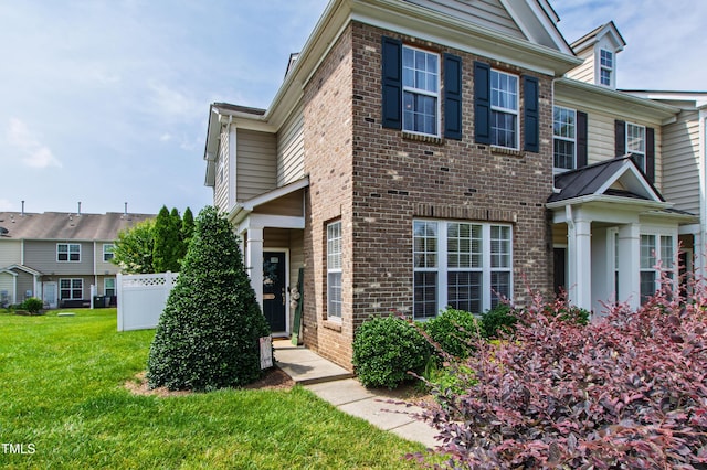 818 Bryant St, Raleigh, NC 27603 - townhome / multi-family property with brick siding and a front lawn
