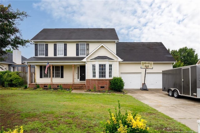 6529 Jacobs Creek Cir, Fayetteville, NC 28306 - view of front of house with a garage, a porch, driveway, a front lawn, and brick siding