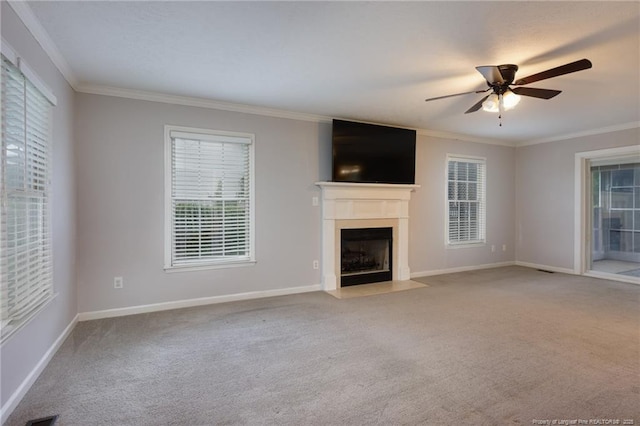 6529 Jacobs Creek Cir, Fayetteville, NC 28306 - unfurnished living room with carpet floors, crown molding, ceiling fan, baseboards, and a fireplace with flush hearth