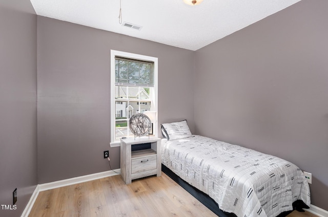 2600 Dwight Pl, Raleigh, NC 27610 - bedroom featuring light wood finished floors and baseboards