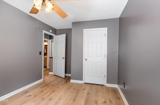 2600 Dwight Pl, Raleigh, NC 27610 - unfurnished bedroom with light wood finished floors and ceiling fan