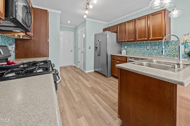 5561 Roan Mountain Pl, Raleigh, NC 27613 - kitchen with appliances with stainless steel finishes, brown cabinetry, crown molding, light countertops, and light wood-style floors