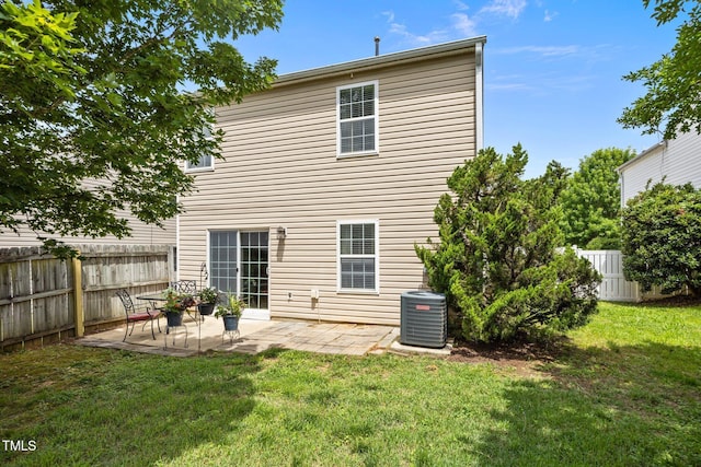 5561 Roan Mountain Pl, Raleigh, NC 27613 - rear view of house with a patio