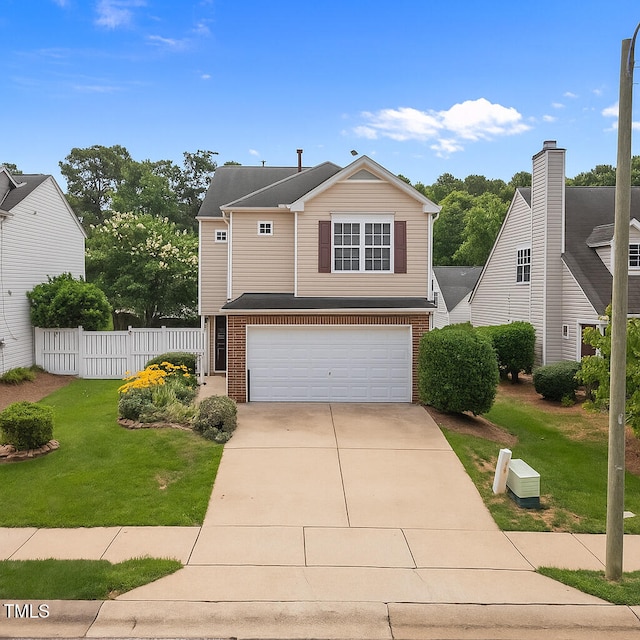 5561 Roan Mountain Pl, Raleigh, NC 27613 - view of front of house with brick siding, an attached garage, and concrete driveway