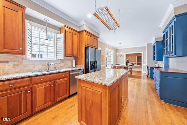 305 Lochridge Dr, Roxboro, NC 27573 - kitchen with dishwasher, black fridge, crown molding, a kitchen island, and a chandelier