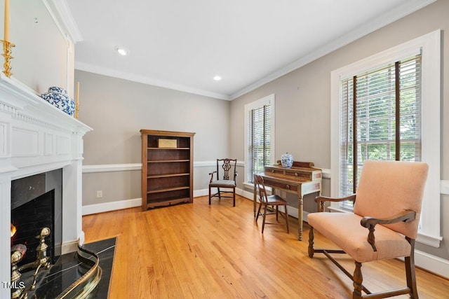 305 Lochridge Dr, Roxboro, NC 27573 - sitting room featuring crown molding, light wood finished floors, recessed lighting, and a fireplace