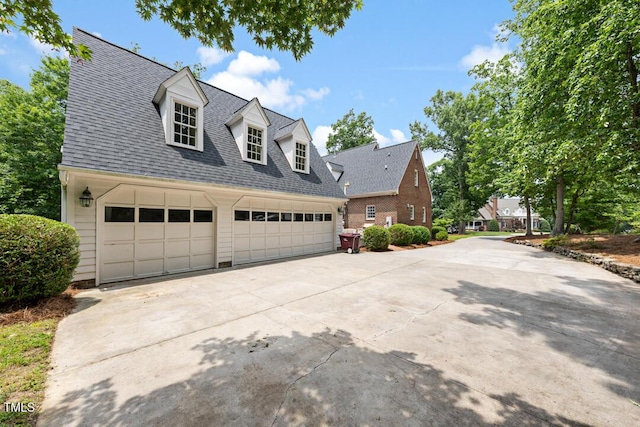 305 Lochridge Dr, Roxboro, NC 27573 - view of home's exterior with concrete driveway and a shingled roof