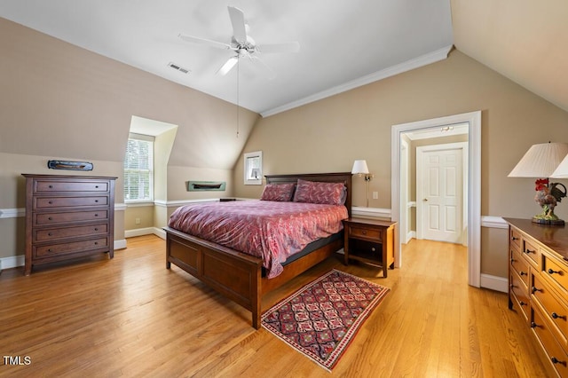 305 Lochridge Dr, Roxboro, NC 27573 - bedroom featuring vaulted ceiling, light wood-style flooring, and a ceiling fan