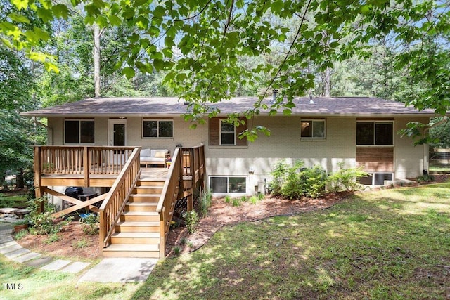 6609 Hunters Ln, Durham, NC 27713 - rear view of property with brick siding, a wooden deck, stairs, a lawn, and roof with shingles