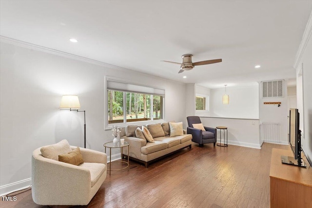 6609 Hunters Ln, Durham, NC 27713 - living area featuring crown molding, ceiling fan, hardwood / wood-style flooring, and recessed lighting