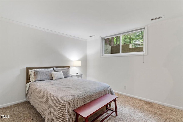 6609 Hunters Ln, Durham, NC 27713 - carpeted bedroom with ornamental molding and baseboards