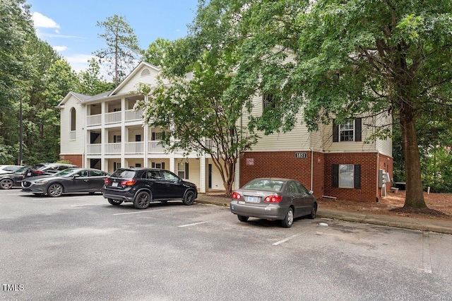 1851 Trailwood Heights Ln, Raleigh, NC 27603 - view of building exterior featuring uncovered parking