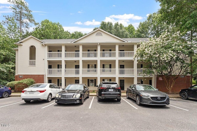 1851 Trailwood Heights Ln, Raleigh, NC 27603 - view of property featuring uncovered parking