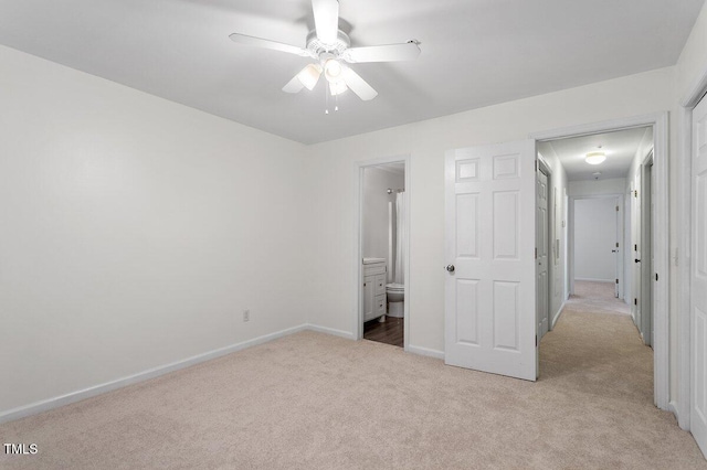 1851 Trailwood Heights Ln, Raleigh, NC 27603 - unfurnished bedroom with carpet, ensuite bathroom, and a ceiling fan