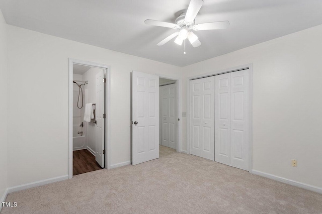 1851 Trailwood Heights Ln, Raleigh, NC 27603 - unfurnished bedroom with carpet, a closet, connected bathroom, and a ceiling fan