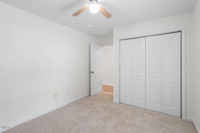 1851 Trailwood Heights Ln, Raleigh, NC 27603 - unfurnished bedroom with carpet, a closet, and ceiling fan
