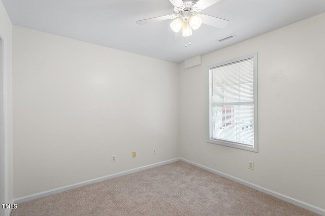 1851 Trailwood Heights Ln, Raleigh, NC 27603 - carpeted empty room featuring baseboards and a ceiling fan