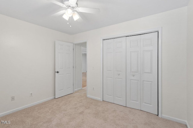 1851 Trailwood Heights Ln, Raleigh, NC 27603 - unfurnished bedroom with light carpet, a closet, and a ceiling fan