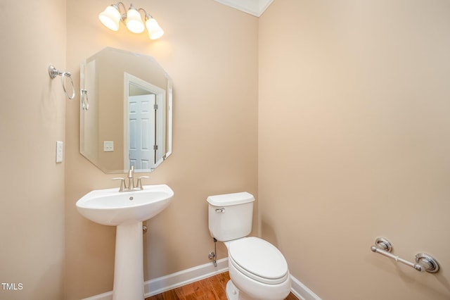 404 Panorama Park Pl, Cary, NC 27519 - half bathroom featuring toilet and wood finished floors