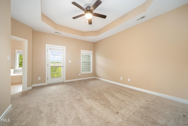 404 Panorama Park Pl, Cary, NC 27519 - empty room featuring carpet flooring, ceiling fan, and a tray ceiling