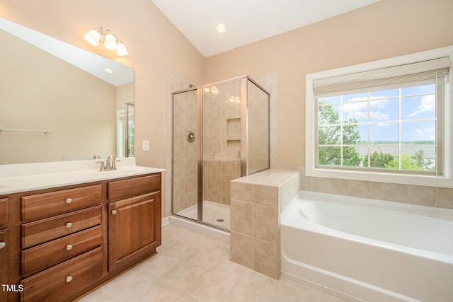 404 Panorama Park Pl, Cary, NC 27519 - bathroom with a garden tub, tile patterned flooring, double vanity, a shower stall, and recessed lighting
