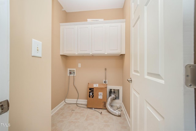 404 Panorama Park Pl, Cary, NC 27519 - laundry area with electric dryer hookup, light tile patterned floors, cabinet space, and washer hookup