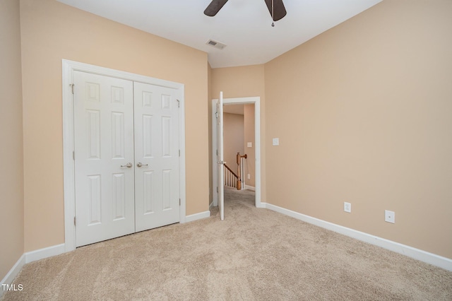 404 Panorama Park Pl, Cary, NC 27519 - unfurnished bedroom with carpet floors, a closet, and a ceiling fan
