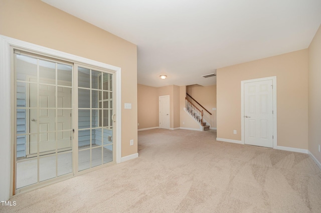 404 Panorama Park Pl, Cary, NC 27519 - carpeted empty room featuring stairs and baseboards
