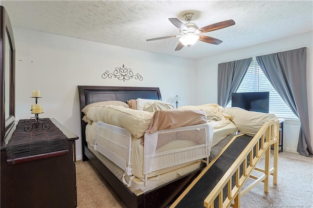 874 Santiato Dr, Fayetteville, NC 28314 - bedroom featuring light colored carpet, a textured ceiling, ceiling fan, and baseboards