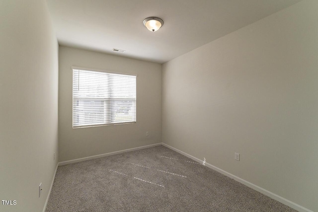 227 Liam St, Clayton, NC 27520 - spare room with carpet flooring and baseboards