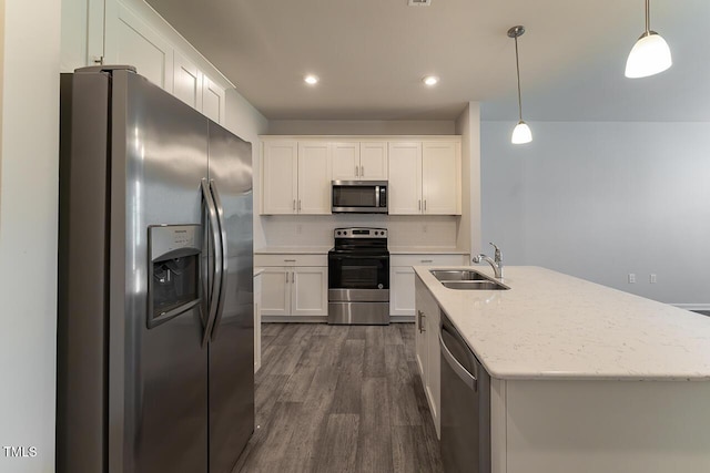 227 Liam St, Clayton, NC 27520 - kitchen featuring appliances with stainless steel finishes, a sink, white cabinetry, decorative backsplash, and recessed lighting