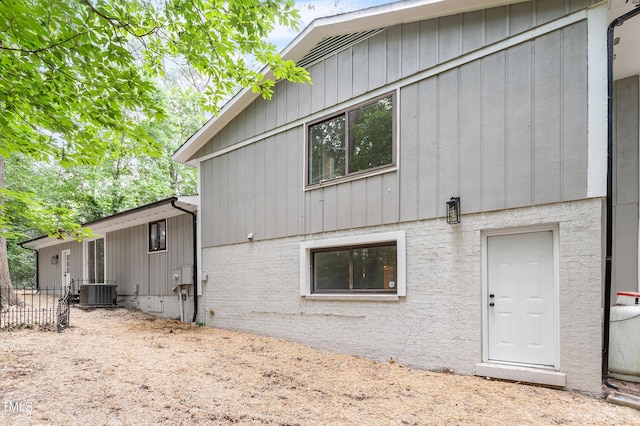 2905 Scuppernong Ln, Durham, NC 27703 - view of side of home with a central AC unit
