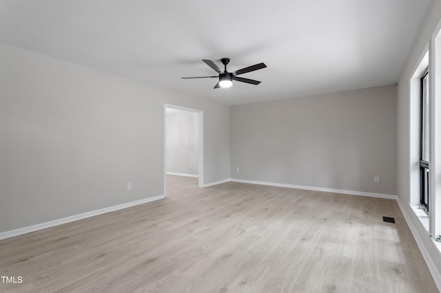 2905 Scuppernong Ln, Durham, NC 27703 - empty room with a ceiling fan and light wood-style floors
