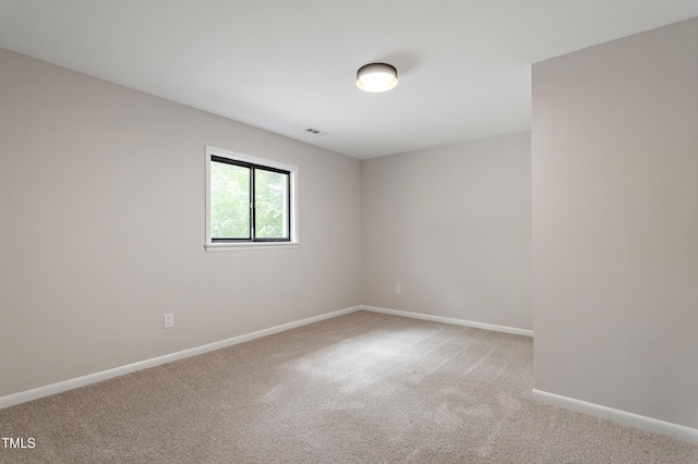 2905 Scuppernong Ln, Durham, NC 27703 - carpeted spare room featuring baseboards