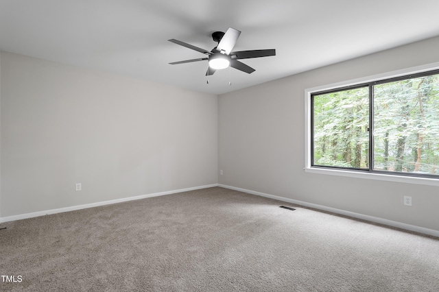 2905 Scuppernong Ln, Durham, NC 27703 - unfurnished room with ceiling fan and carpet floors
