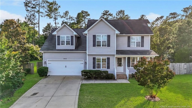 9031 Grouse Run Ln, Fayetteville, NC 28314 - traditional-style house featuring driveway, a porch, and an attached garage