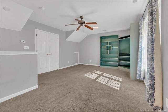 9031 Grouse Run Ln, Fayetteville, NC 28314 - additional living space featuring a ceiling fan, carpet flooring, baseboards, and vaulted ceiling