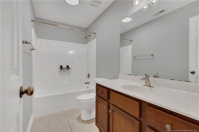 9031 Grouse Run Ln, Fayetteville, NC 28314 - bathroom featuring vanity, toilet, tile patterned flooring, and shower / washtub combination