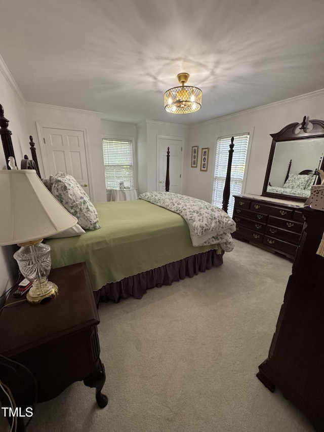 7140 N Ridge Dr, Raleigh, NC 27615 - bedroom featuring multiple windows, carpet, and ornamental molding