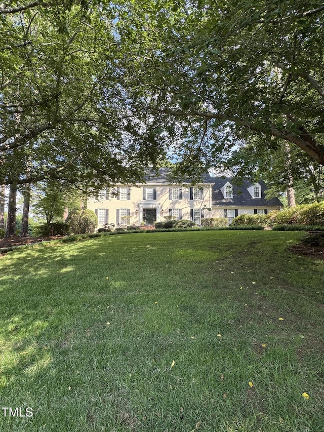 7140 N Ridge Dr, Raleigh, NC 27615 - view of front of property with a front yard