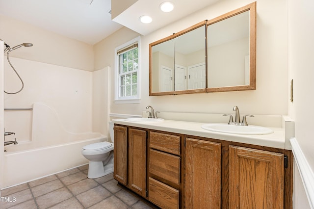 3605 Iron Sight Ct, Raleigh, NC 27616 - bathroom with double vanity, shower / tub combination, and tile patterned flooring