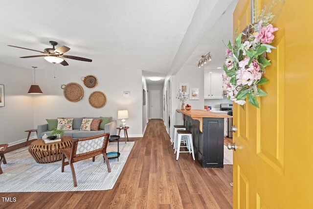 2322 Stroller Ave, Durham, NC 27705 - living area with wood finished floors and ceiling fan